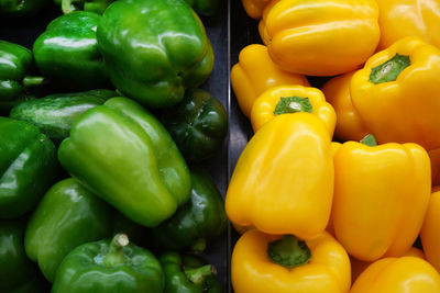 Close-up of yellow bell peppers for sale in market