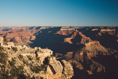 Scenic view of mountains against clear blue sky at grand canyon national park