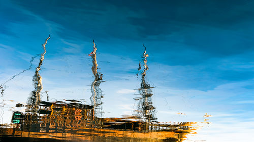 Traditional windmill against blue sky