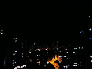 Illuminated cityscape at night