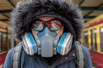 Close-up portrait of person wearing mask