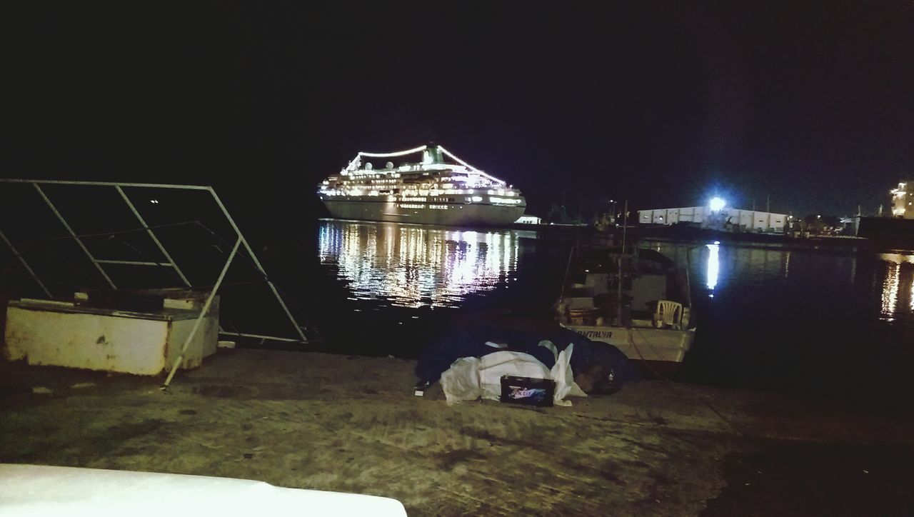 night, water, illuminated, built structure, architecture, transportation, nautical vessel, river, copy space, clear sky, bridge - man made structure, mode of transport, connection, building exterior, boat, reflection, sky, outdoors, no people, sea