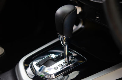 Close-up of gearshift in car