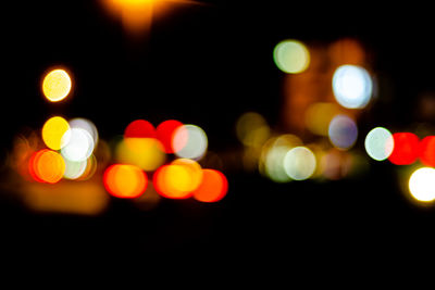 Defocused image of illuminated lights at night