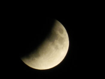 Low angle view of moon against sky at night