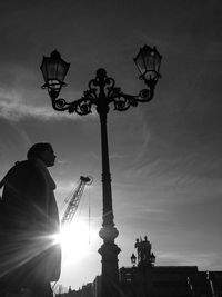 Low angle view of street light against sky