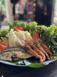 Close-up of fish in plate on table