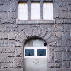 Smiley face on building wall