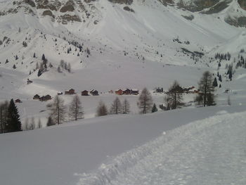 Scenic view of snow covered mountains