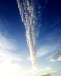 Low angle view of vapor trail against sky