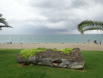 Scenic view of sea against cloudy sky