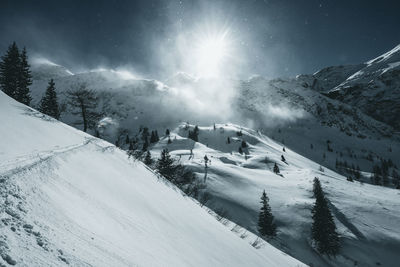 Snow covered mountain against sky