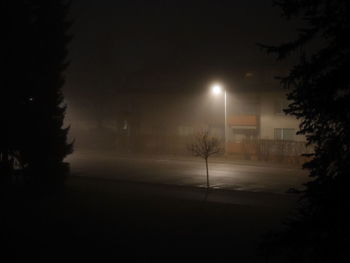 Illuminated street light at night