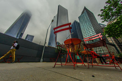 Low angle view of buildings in city against sky