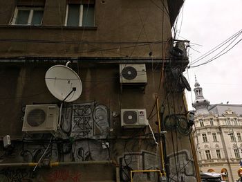 Low angle view of cables against sky