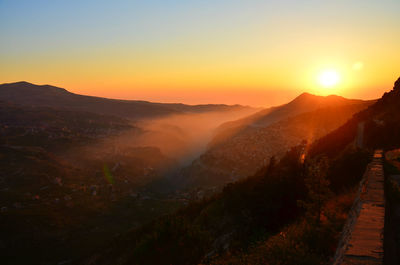 Scenic view of mountains at sunset