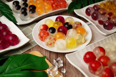 High angle view of fruits in plate on table