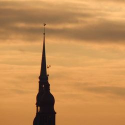 Low angle view of cloudy sky at sunset