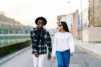 Full length of young woman in city