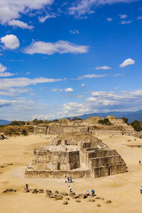 View of old ruins against cloudy sky