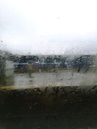 Close-up of wet window in rainy season