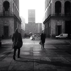 People walking on city street