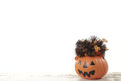 Close-up of pumpkin against gray background