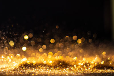 Defocused image of illuminated lights at night