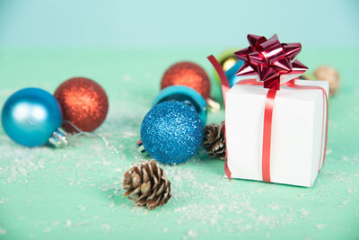 Close-up of christmas decorations on table