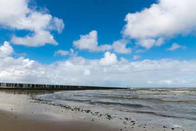 Scenic view of beach against sky