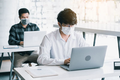 Man working on table