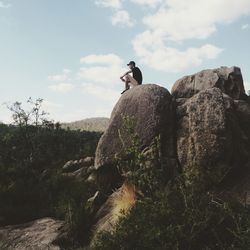 Rear view of young woman looking at view