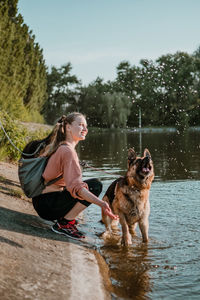 Full length of dog on water