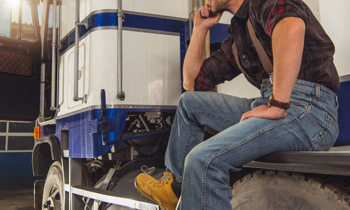 Portrait of senior man working at construction site