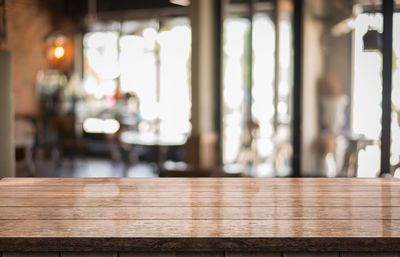 Empty chairs and table in restaurant