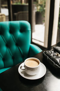 Coffee cup on table