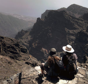 Rear view of people on mountain