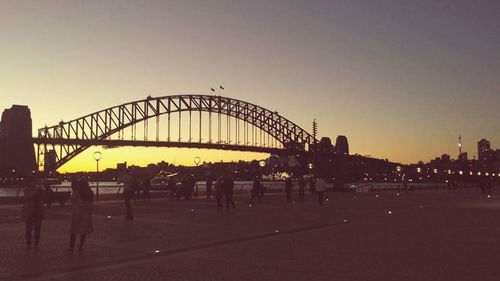 Silhouette of bridge against sky during sunset