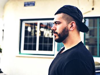 Portrait of young man looking away