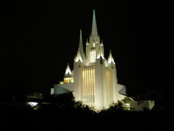 Low angle view of illuminated building at night