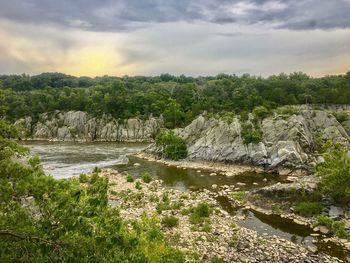 Scenic view of river against sky