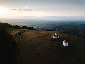 Scenic view of landscape against sky during sunset