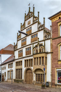 Low angle view of old building against sky