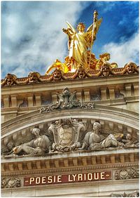 Low angle view of historical building against cloudy sky