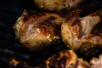 High angle view of meat on barbecue