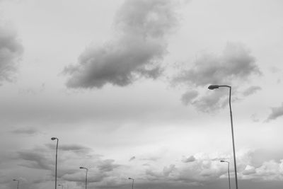 Low angle view of street light against sky