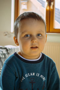 Portrait of cute boy looking away