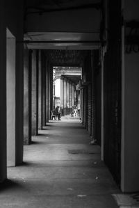 People walking in front of building