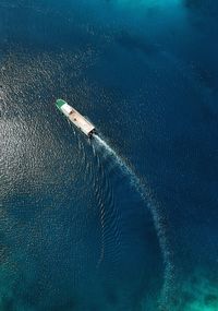 High angle view of sea against blue sky