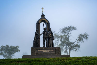 Low angle view of statue against sky